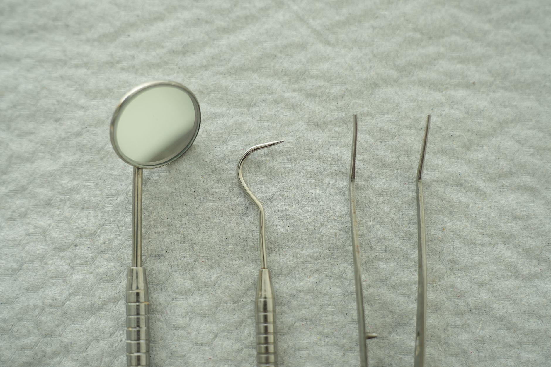 Dentist matching tooth shade for cosmetic consultation
