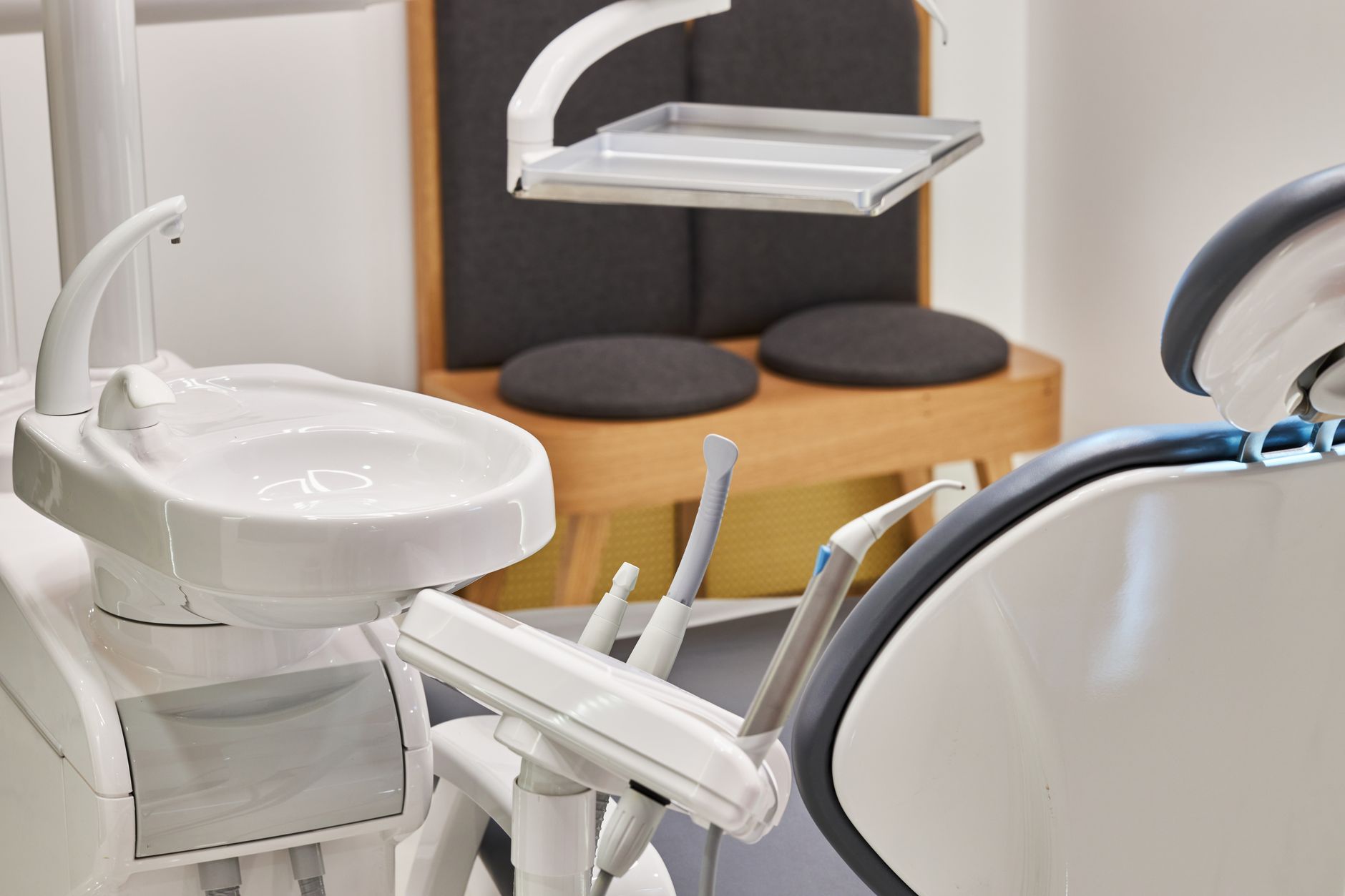 Dentist walking a new patient through a dental model on their first visit